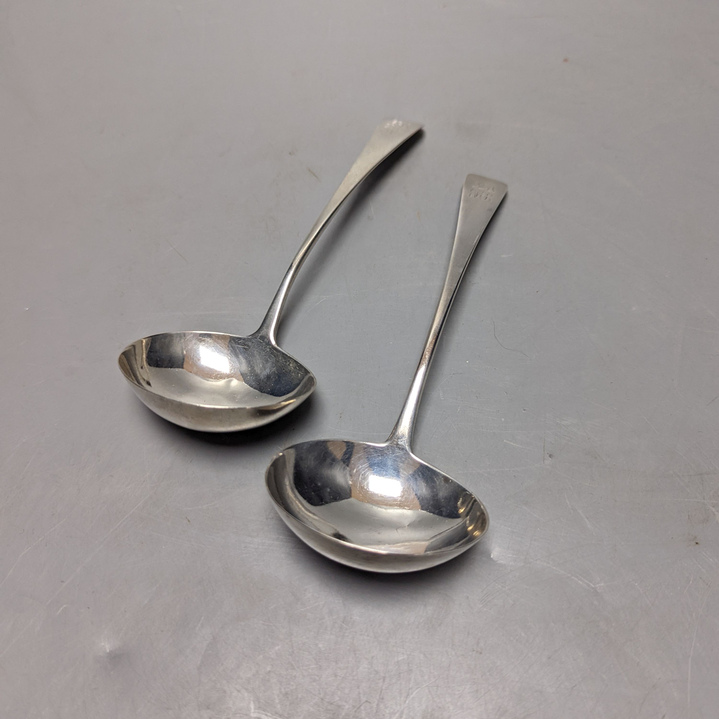 A pair of George III silver Old English pattern sauce ladles, William Edwards, London, 1801, 71 grams.